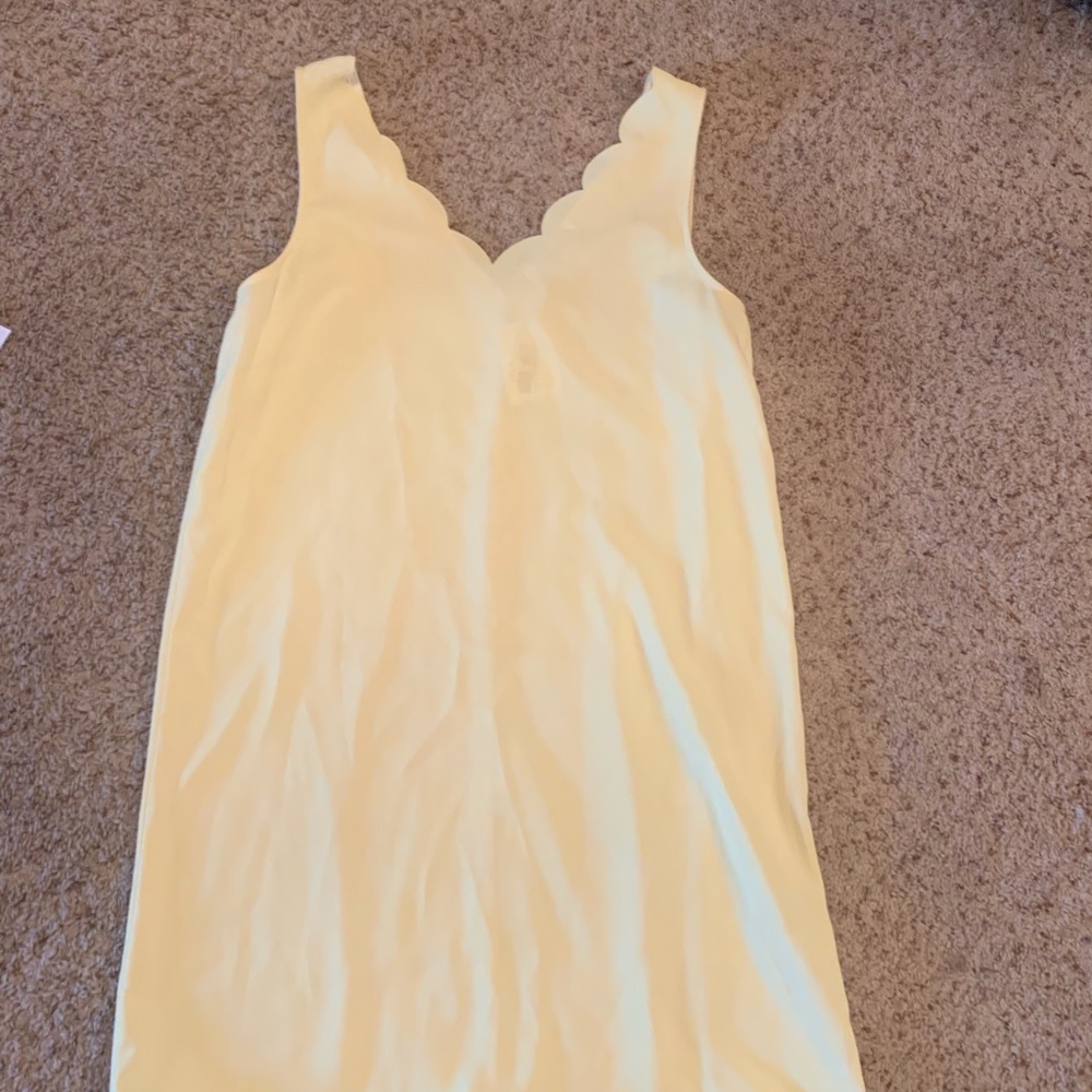 Yellow dress with scallop neckline